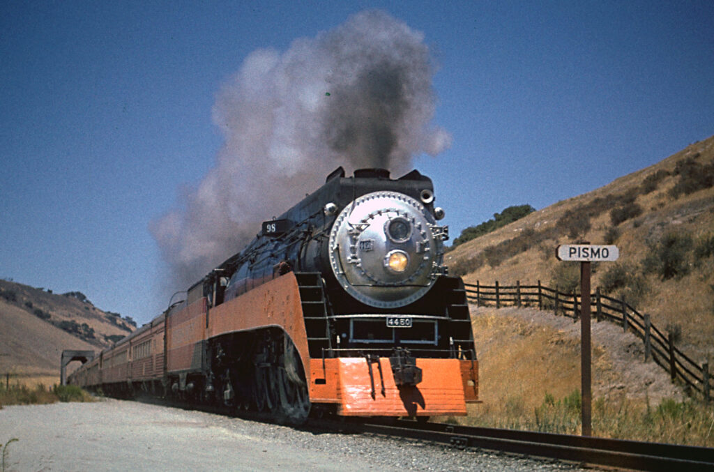 Train 98 being lead by SP 4450 in Daylight colors, heading east out of Price Canyon at Pismo.