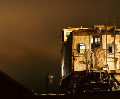 Caboose at Night with inspection worker