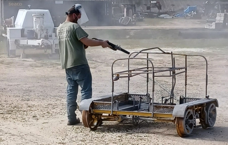 Sandblasting motorcar