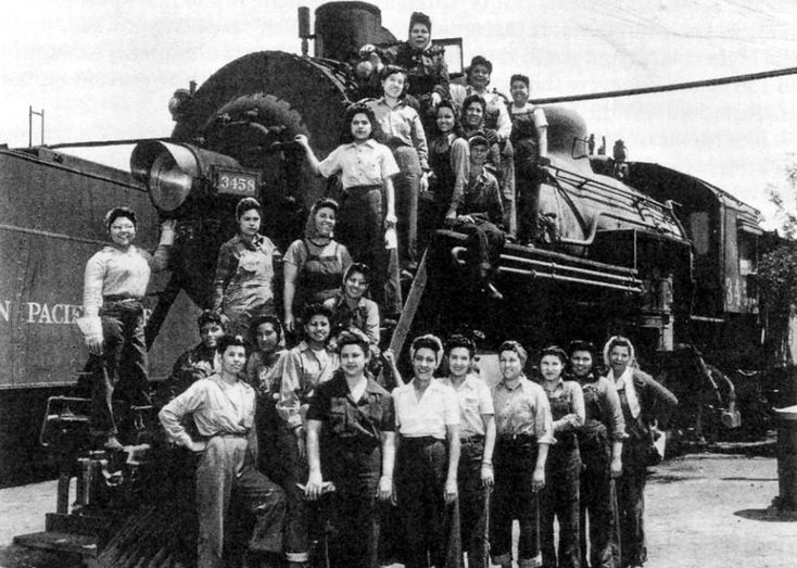 Historic photo women working on steam locomotive